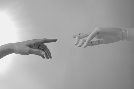 two hands trying to touch each other
