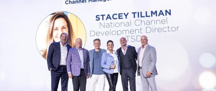 Stacey Tillman with group for winning National Channel Development Director