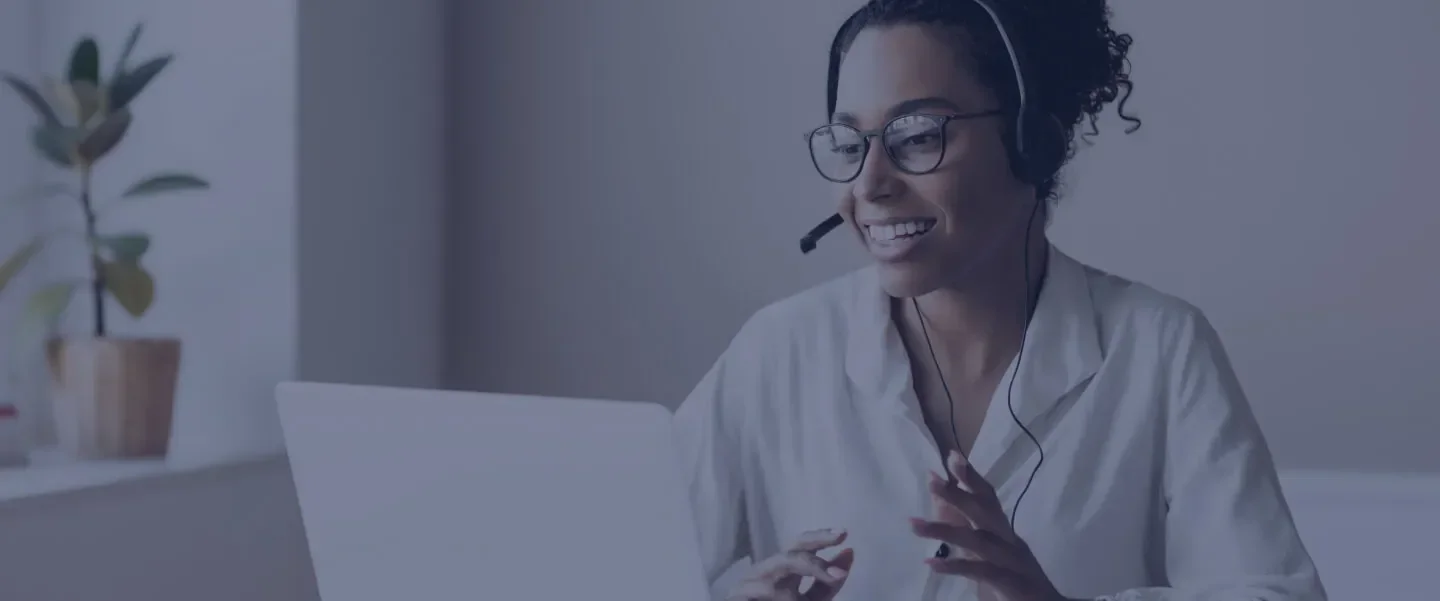 Female employee using the latest Five9 technology