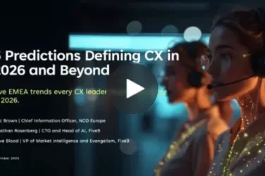 Woman wearing a headset, focused on a screen with glowing accents in a dark environment.