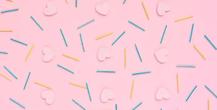 pink background with sprinkles