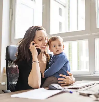 Woman on Phone with Baby