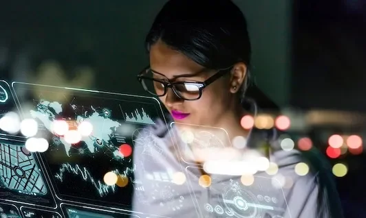 Woman Using Computer Database
