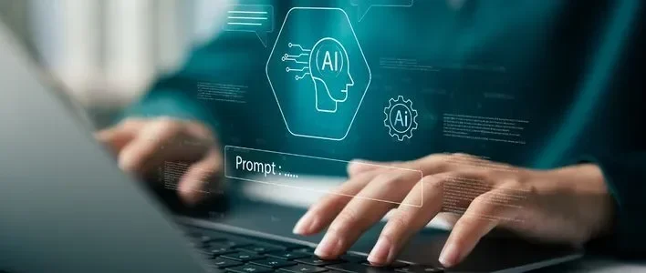 Hands on a laptop keyboard with AI graphics overlay.