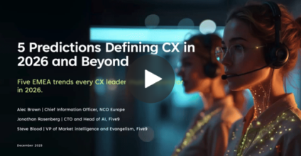 Woman wearing a headset, focused on a screen with glowing accents in a dark environment.